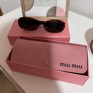 Gafas de sol miu miu
